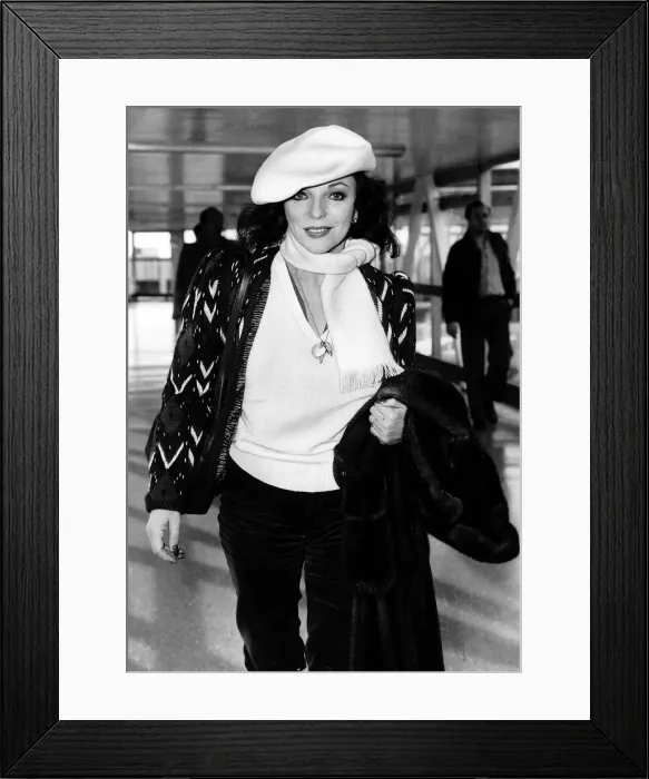 Framed Print : British actress Joan Collins at Heathrow Airport in February 1982 Framed Print : British actress Joan Collins at Heathrow Airport in February 1982
