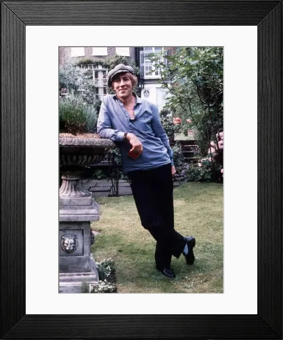  : Peter Cook actor in the garden of his home