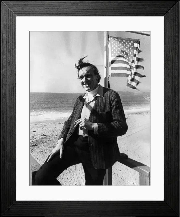 Framed Print : Eric Porter British actor standing on a beach under the American Flag Framed Print : Eric Porter British actor standing on a beach under the American Flag