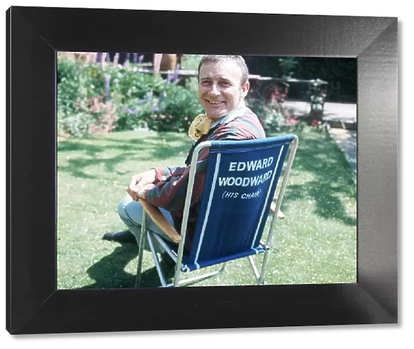 Edward Woodward actor sits in garden June 1970 Dbase MSi