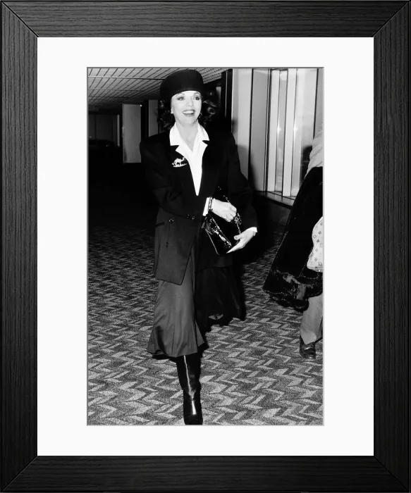 Framed Print : Joan Collins actress starred in Dynasty arrives at Heathrow, February 1988