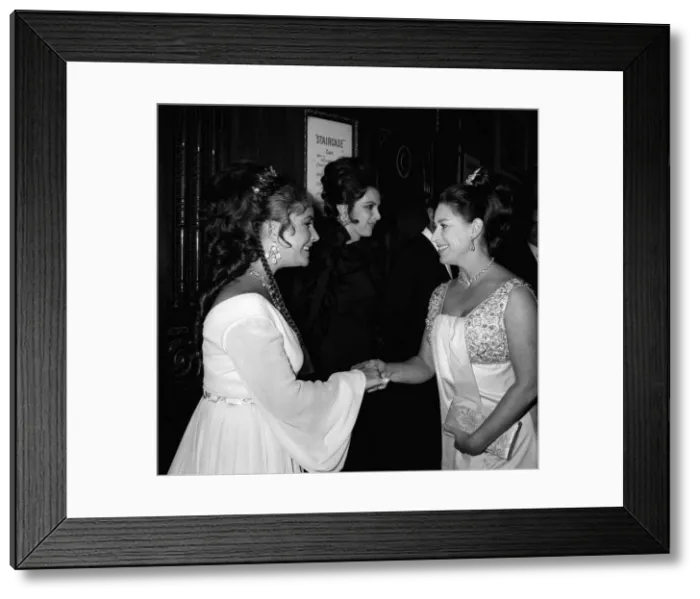 Framed Print : Elizabeth Taylor shaking hands with Princess Margaret at premiere of Framed Print : Elizabeth Taylor shaking hands with Princess Margaret at premiere of