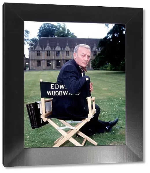 Edward Woodward Actor  /  Director Sitting on chair in grounds July 1987 Dbase