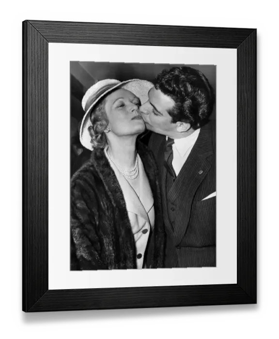 Framed Print : Frankie Vaughan actor gives Anna Neagle a kiss at Variety Awards April 1958
