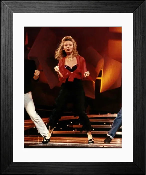 Framed Print : Kylie Minogue Singer Actress on stage performing, August 1989 Framed Print : Kylie Minogue Singer Actress on stage performing, August 1989
