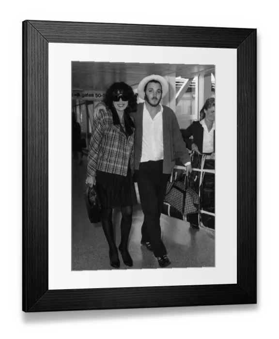 Framed Print : Joan Collins with her son Sacha aged 22 arriving from Los Angeles at Heathrow airport Framed Print : Joan Collins with her son Sacha aged 22 arriving from Los Angeles at Heathrow airport