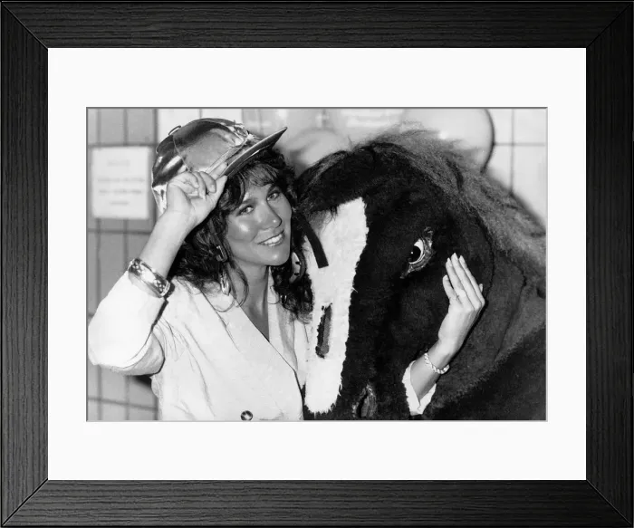 Framed Print : Linda Lusardi model actress standing with pantomime horse Framed Print : Linda Lusardi model actress standing with pantomime horse