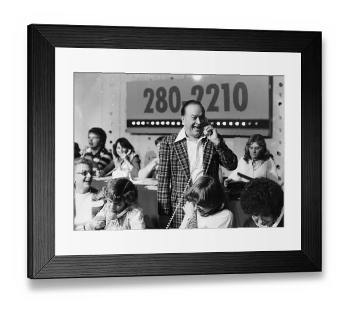 Framed Print : Bob Hope Actor In Fargo USA Answering CAlls From Viewers On A Phone In Charity Appeal
