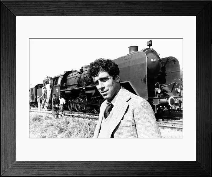 Framed Print : Elliott Gould actor standing in front of a steam train in a scene from the film The Lady Framed Print : Elliott Gould actor standing in front of a steam train in a scene from the film The Lady