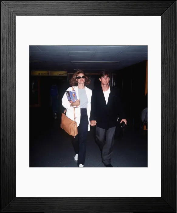 Framed Print : Tom Cruise actor and wife leaving Heathrow for holiday in Moscow August 1987 Framed Print : Tom Cruise actor and wife leaving Heathrow for holiday in Moscow August 1987