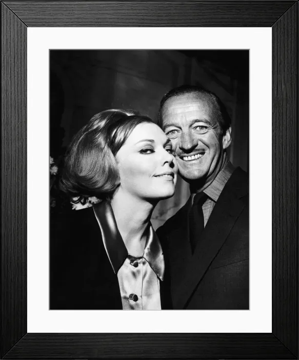 Framed Print : Actor David Niven seen with actress Kim Novak at a party at the Savoy Hotel London during Framed Print : Actor David Niven seen with actress Kim Novak at a party at the Savoy Hotel London during