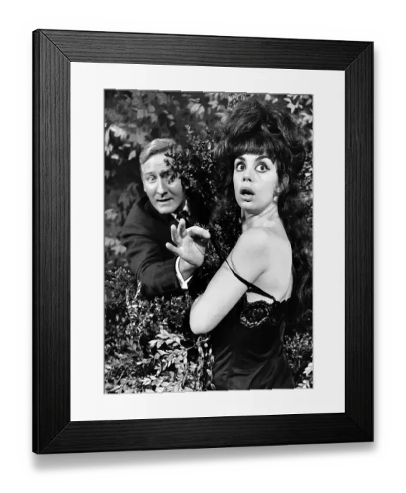 Framed Print : Leslie Phillips actor with actress Catherine Feller in one of the scenes from the film