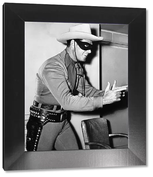 Actor Clayton Moore who plays the Lone Ranger in the televisin programme minus his guns