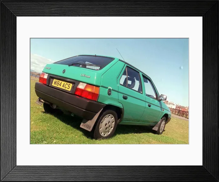 Framed Print : Second hand Skoda Favorit vehicle June 1999 green body colour Framed Print : Second hand Skoda Favorit vehicle June 1999 green body colour