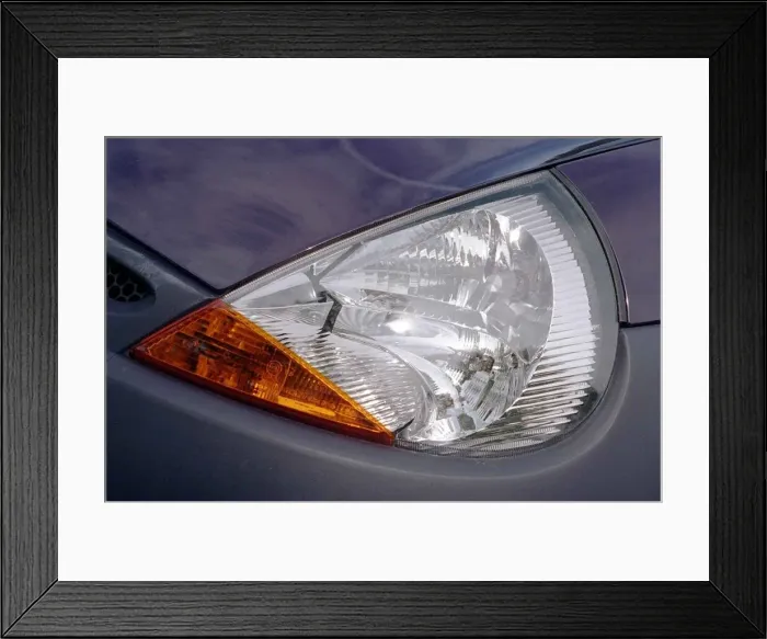 Framed Print : Ford KA car headlight August 1997