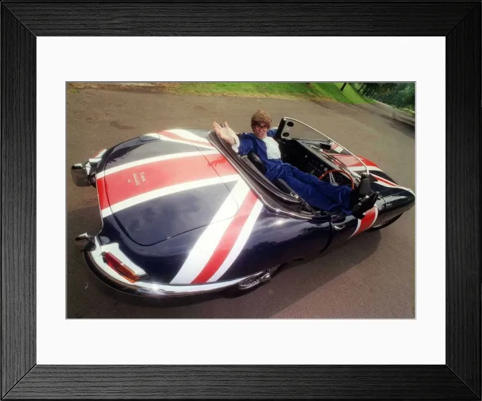 Framed Print : John Dingwall dressed as Austin Powers in E Type Jaguar car September 1999 Union Jack Framed Print : John Dingwall dressed as Austin Powers in E Type Jaguar car September 1999 Union Jack