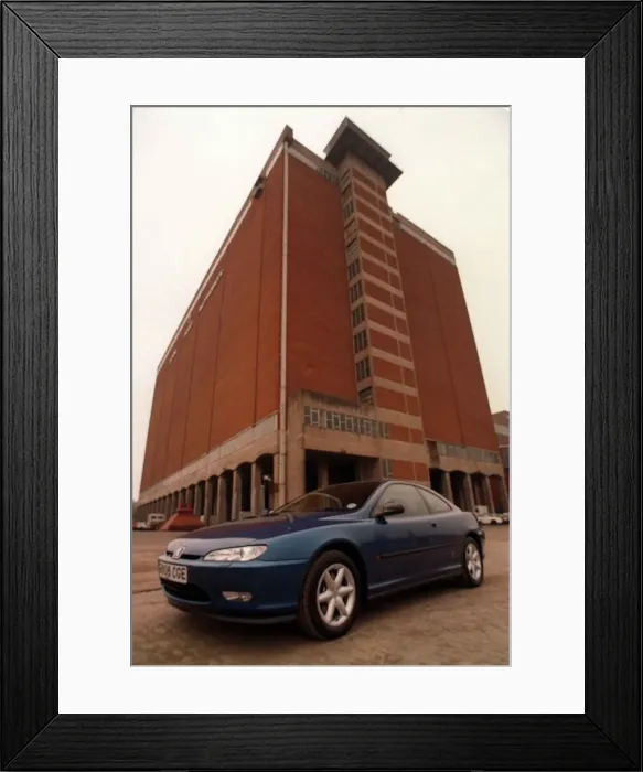 Framed Print : BLUE PEUGEOT 406 COUPE CAR AUGUST 1997 IN FRONT OF BUILDING