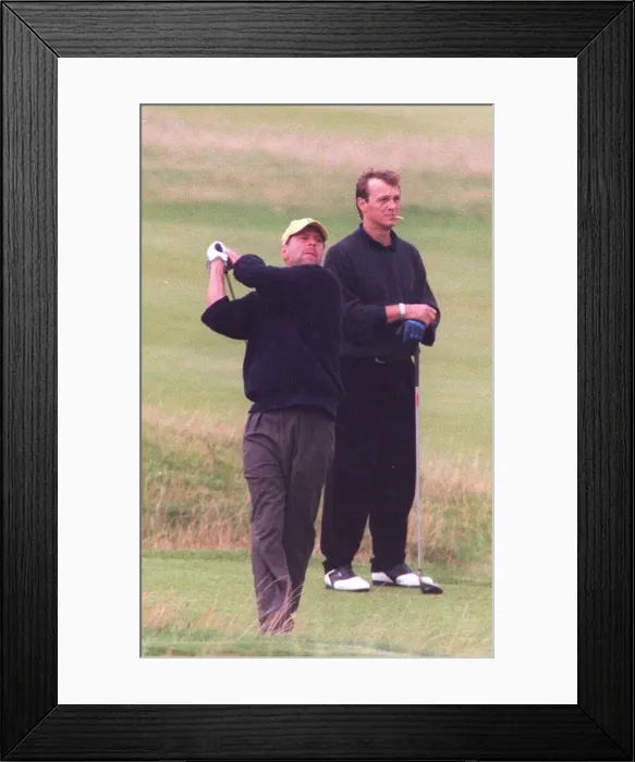 Framed Print : Bruce Willis playing golf at Prestwick. August 1998