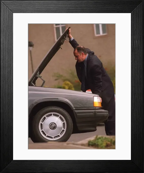 Framed Print : Russell Keeny looking under bonnet of car Framed Print : Russell Keeny looking under bonnet of car