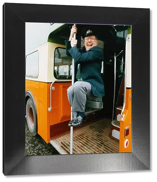 Andy Cameron having fun on a double decker bus March 1993