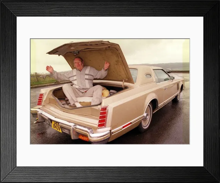Framed Print : Alan Robertson sitting inside boot of his Lincoln Continental June 1999 Framed Print : Alan Robertson sitting inside boot of his Lincoln Continental June 1999