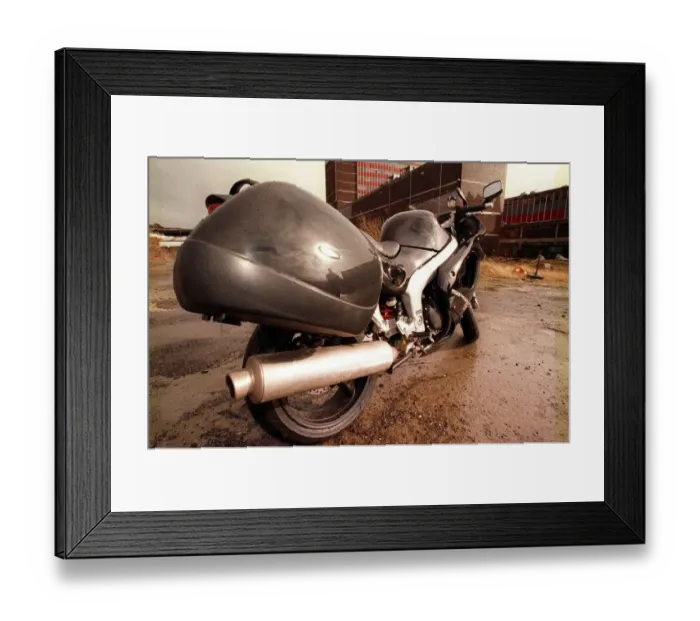 Framed Print : Black Triumph Motorbike March 1999 At the back of the Daily Record Framed Print : Black Triumph Motorbike March 1999 At the back of the Daily Record