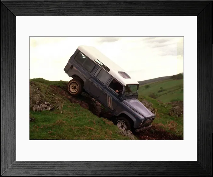 Framed Print : 4X4 OFF ROAD INSTRUCTION FOR ROAD RECORD LAND ROVER DEFENDER GOING OVER RIDGE AT THE TOP Framed Print : 4X4 OFF ROAD INSTRUCTION FOR ROAD RECORD LAND ROVER DEFENDER GOING OVER RIDGE AT THE TOP