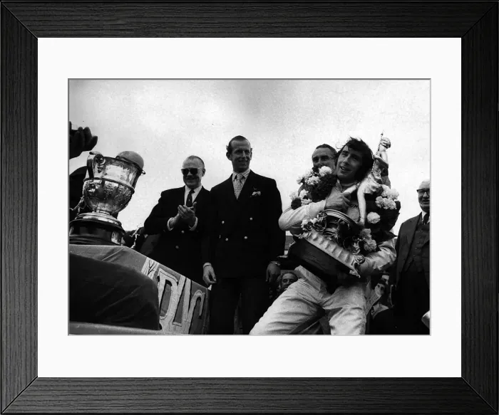 Framed Print : Jackie Stewart after winning British Grand Prix holding trophy July 1969 Framed Print : Jackie Stewart after winning British Grand Prix holding trophy July 1969