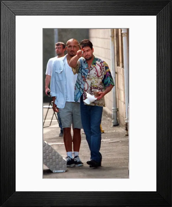 Framed Print : Charlie Sheen actor filming July 1997, at Clydebank Town Hall near Glasgow with cup of