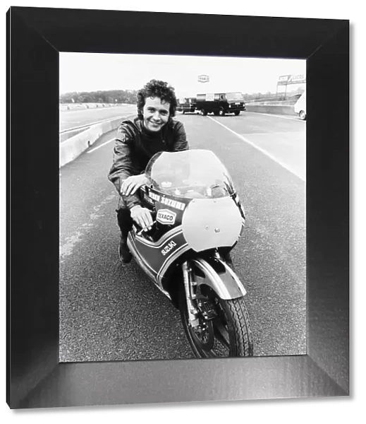David Essex on the set of his film Silver Dream Racer sitting on a £40