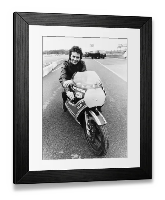 Framed Print : David Essex on the set of his film Silver Dream Racer sitting on a £40 Framed Print : David Essex on the set of his film Silver Dream Racer sitting on a £40