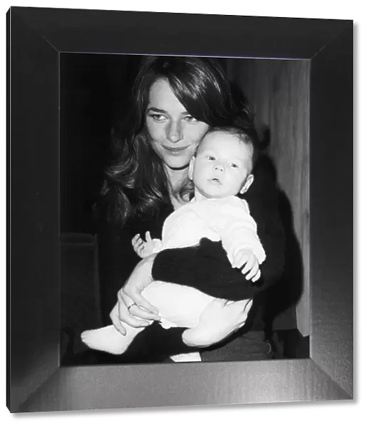 Charlotte Rampling - January 1973 At Heathrow Airport with her baby Barnaby