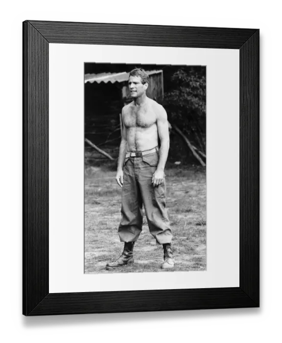 Framed Print : Ryan O Neal Film Actor during a break enjoys a game of Frisbee - August 1976Dbase MSI