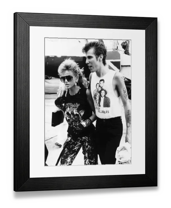 Framed Print : Britt Ekland with her boyfriend Slim Jim McDonnell pictured here at Heathrow Airport Framed Print : Britt Ekland with her boyfriend Slim Jim McDonnell pictured here at Heathrow Airport