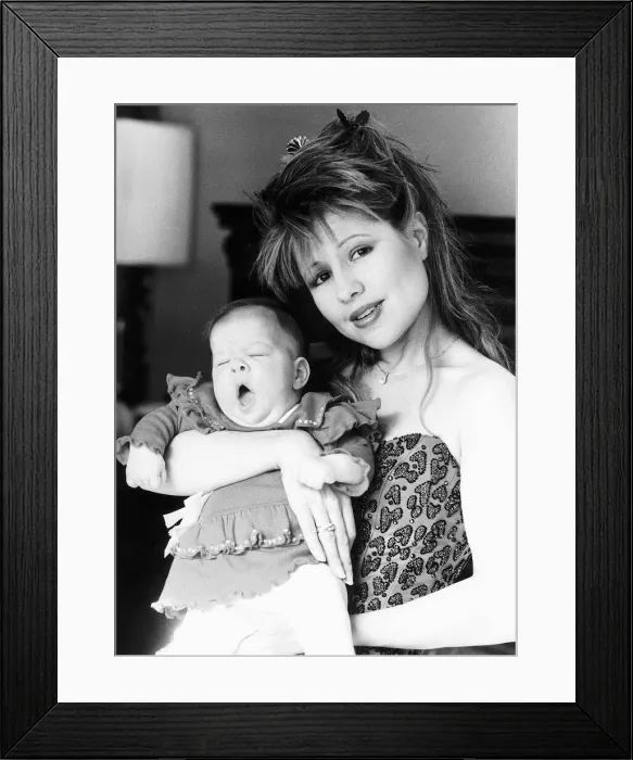 Framed Print : Pia Zadora with baby daughter Kady March 1985 DBASE MSI Framed Print : Pia Zadora with baby daughter Kady March 1985 DBASE MSI