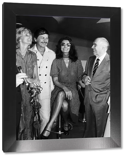 Charles Bronson Actor standing with wife Jill Ireland Actress Sophia Loren