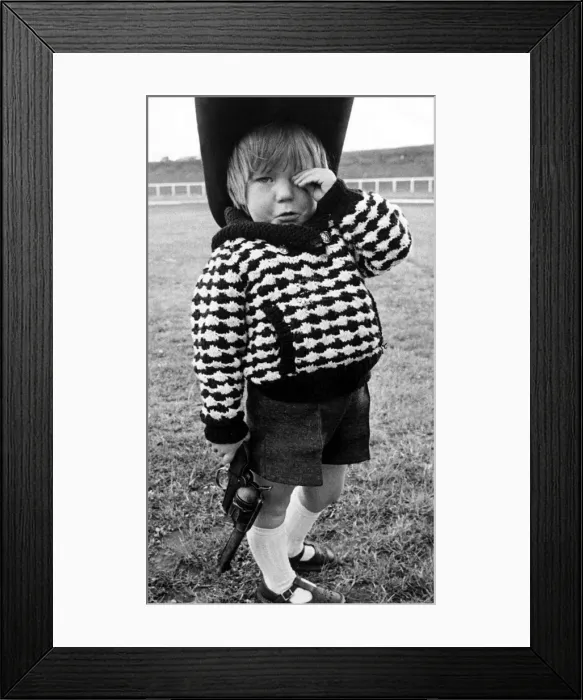 Framed Print : Children - Boys Young Jimmy Dickson, wearing a cowboys hat and holding a gun Framed Print : Children - Boys Young Jimmy Dickson, wearing a cowboys hat and holding a gun