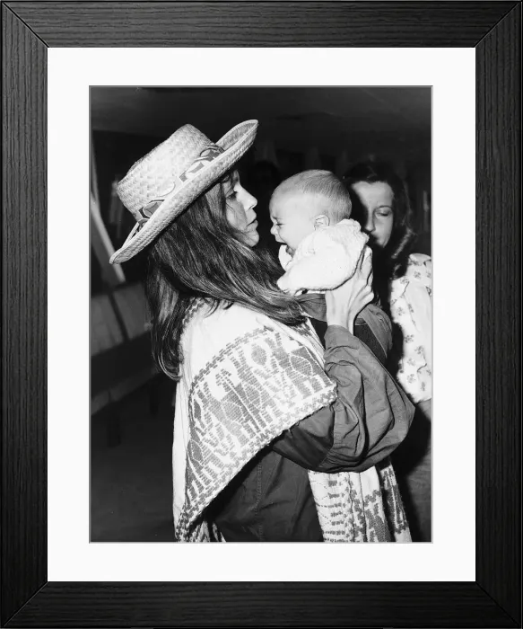 Framed Print : Mia Farrow Actress comforts Baby Fletcher - July 1974 Dbase MSI Framed Print : Mia Farrow Actress comforts Baby Fletcher - July 1974 Dbase MSI