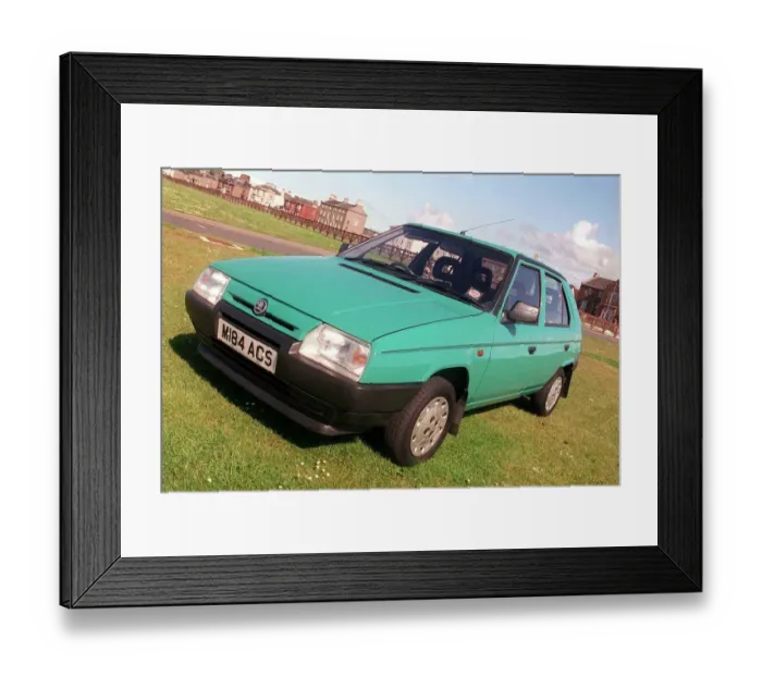 Framed Print : Second hand Skoda Favorit vehicle June 1999 green body colour Framed Print : Second hand Skoda Favorit vehicle June 1999 green body colour