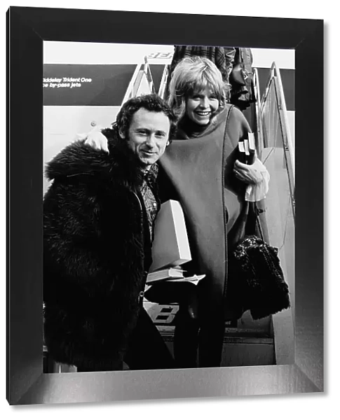 Susannah York and her husband - February 1972 Boarding the plane for
