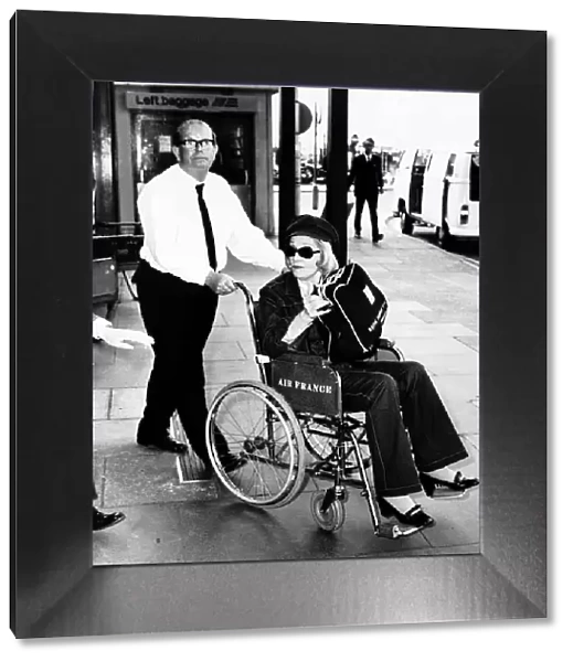 Marlene Dietrich Actress Leaves london airport in a wheelchair Dbase MSI