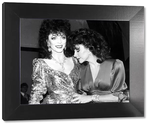 Joan Collins Actress holding waxwork model of herself March 1989