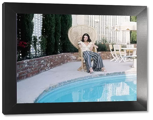 Actress Joan Collins at her Beverly Hills home - June 1975 dbase MSI