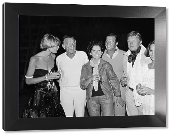 Richard Burton Actor with wife Susan And friends Luisa Moore actor Roger Moore