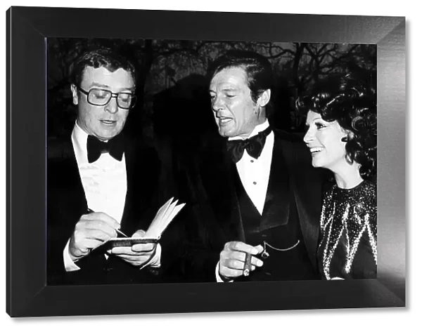 Michael Caine and Roger Moore - April 1976 Michael Caine actor attends