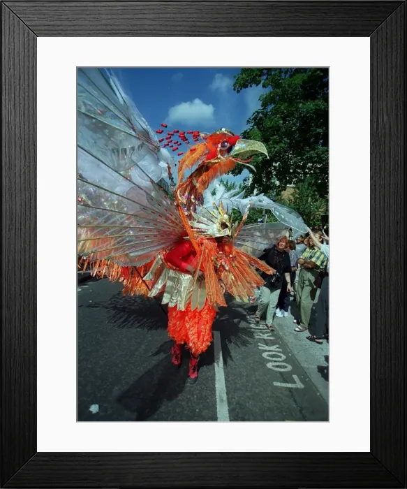 Framed Print : The Notting Hill Carnival Aug 1999 Dancers in the streets of Notting Hill wearing Framed Print : The Notting Hill Carnival Aug 1999 Dancers in the streets of Notting Hill wearing