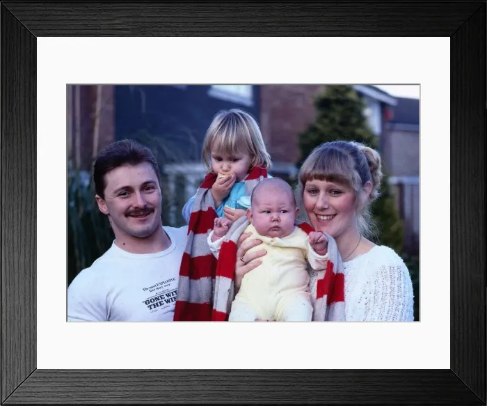 Framed Print : The Wedding television programme Mark and Karen Jones with baby daughter Sara Framed Print : The Wedding television programme Mark and Karen Jones with baby daughter Sara