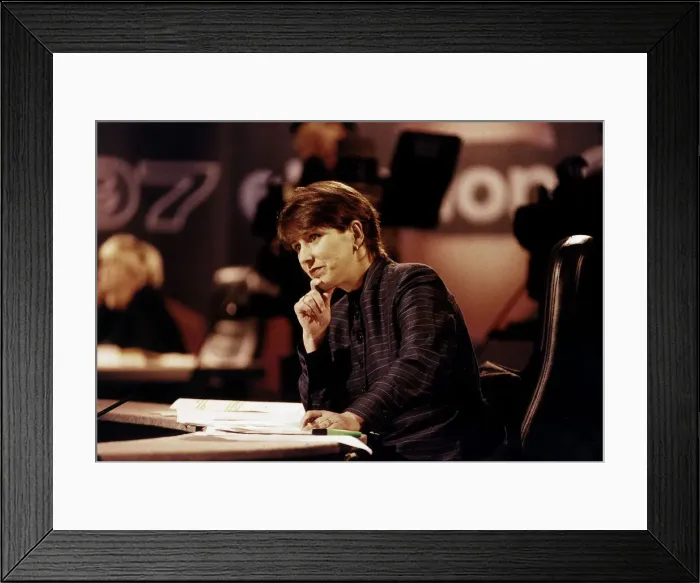 Framed Print : Kirsty Wark TV Presenter during Election results program sitting at desk in studio hand Framed Print : Kirsty Wark TV Presenter during Election results program sitting at desk in studio hand