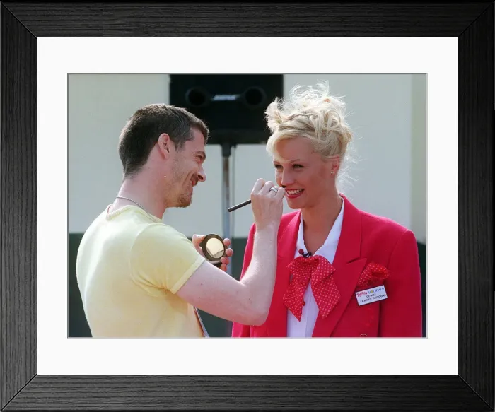 Framed Print : TV Presenter Denise Van Outen of the Big Breakfast Show having her make up put on August