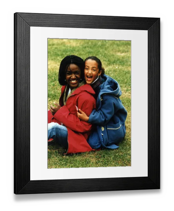 Framed Print : Diane Louise Jordan with young girl her niece Justine wearing blue jacket